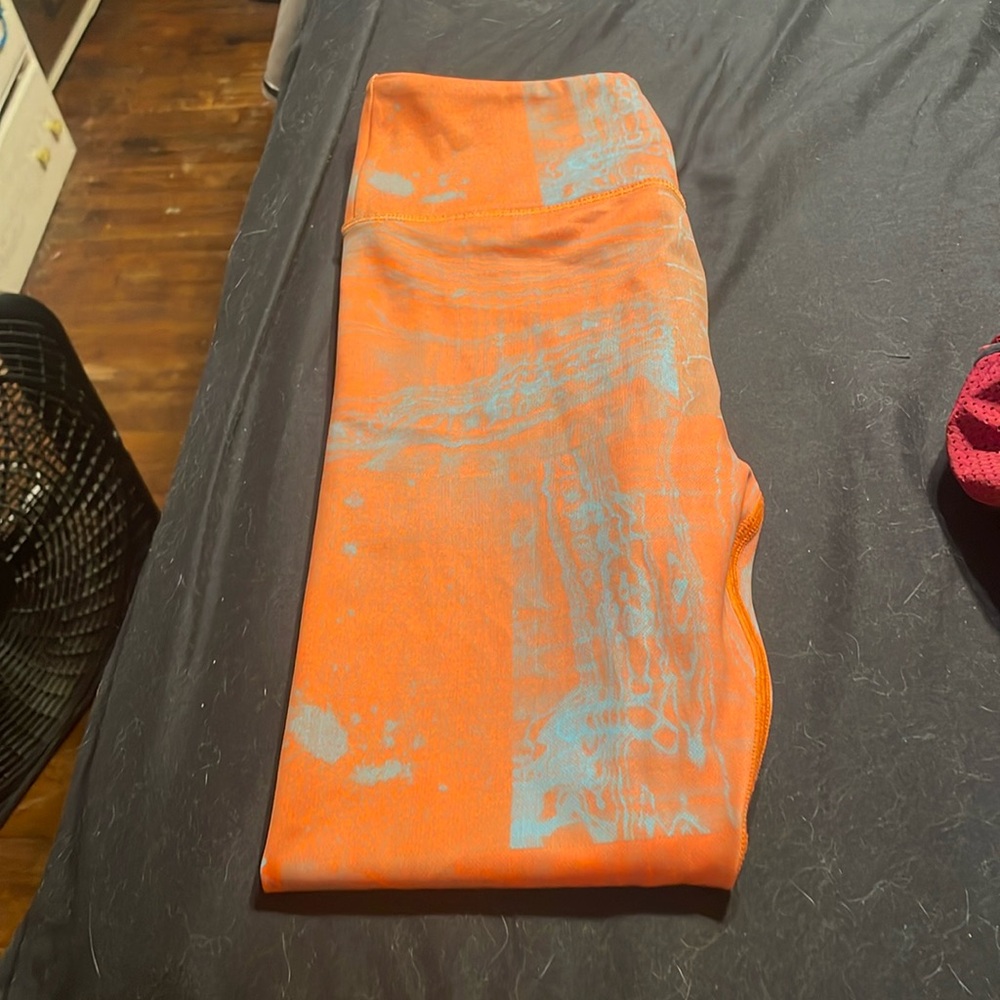 Like new orange and grey zyia leggings size small